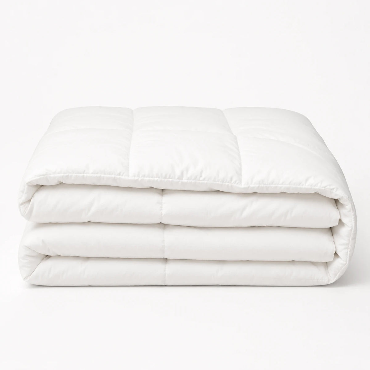 Couette blanche pliée, vue de face