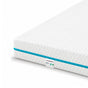 Zoom sur la housse blanche et le liseré bleu du matelas Idéal 16 cm