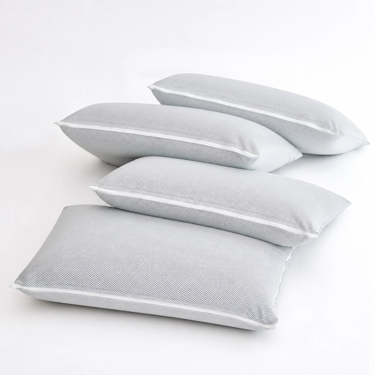 Oreillers à mémoire de forme en tissu 3D gris, vue de trois quarts