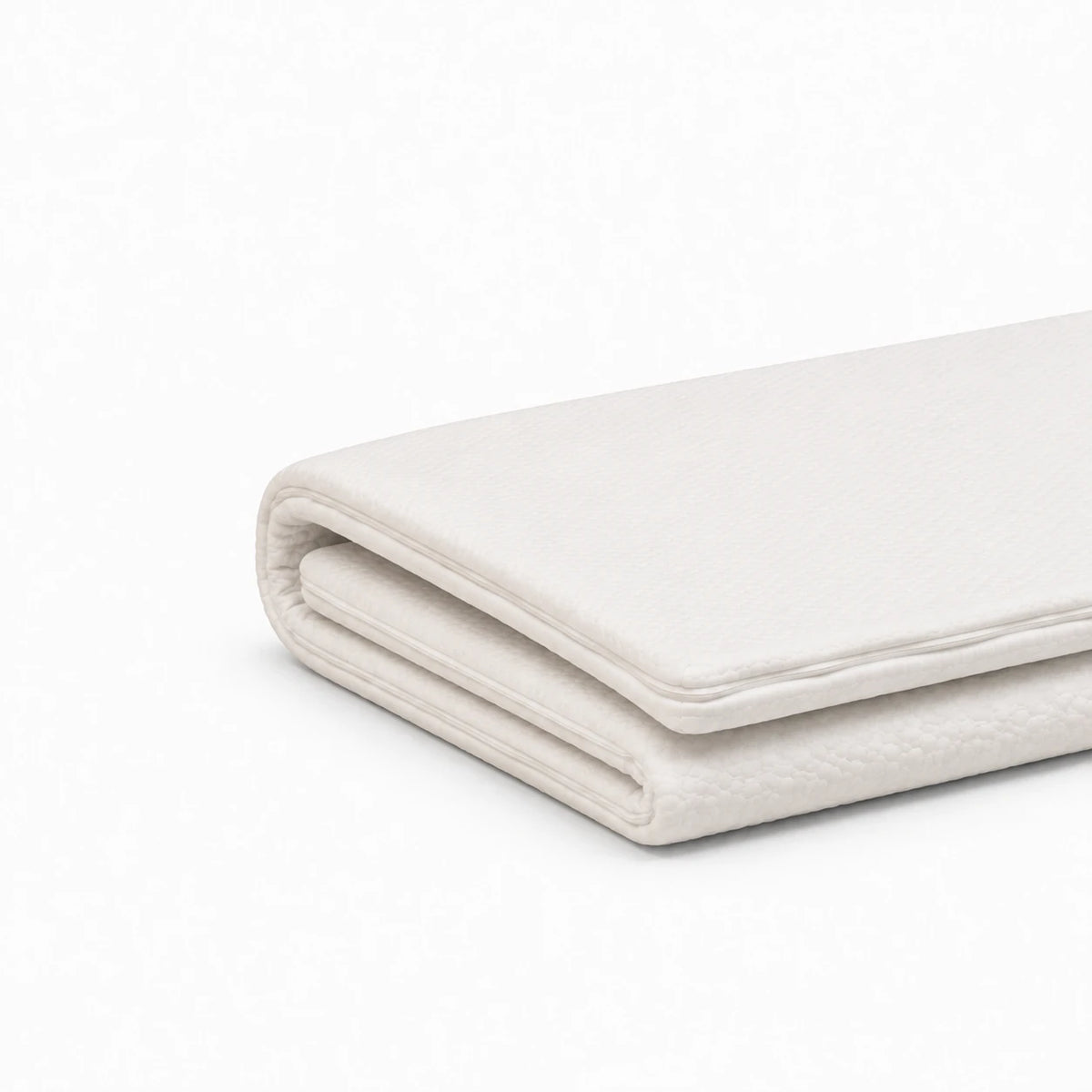 Zoom sur le surmatelas à mémoire de forme plié