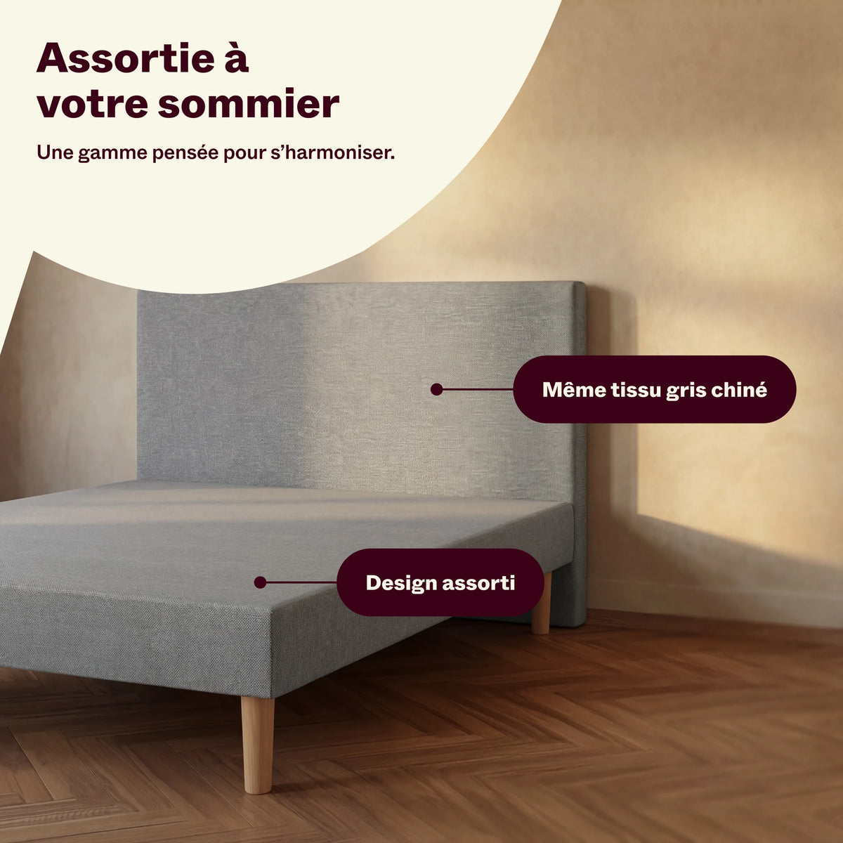 Tête de lit grise assortie à un sommier tapissier dans le même tissu gris chiné